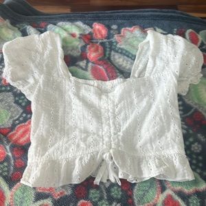 super cute white top!